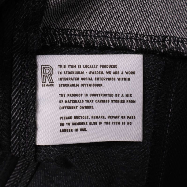 Invändig etikett med information om lokal produktion och material