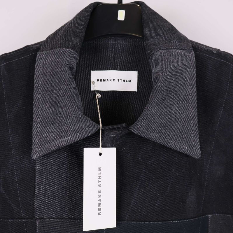 Närbild på krage och etikett med Remake Sthlm-text
