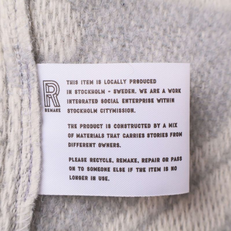 Textil-etikett med information om lokal produktion av plagget