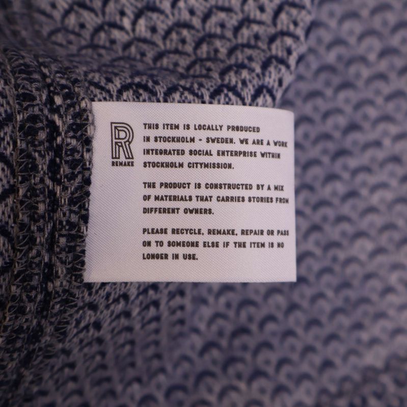 Textetikett om lokal produktion och materialmix