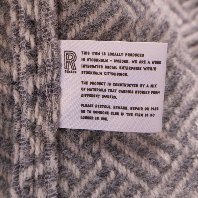 Insydd etikett med information om lokal produktion och material