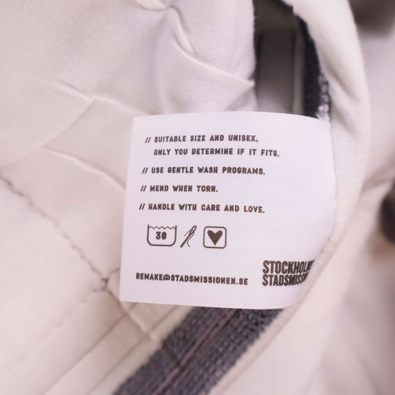 Tvättrådsetikett med symboler och skötselråd