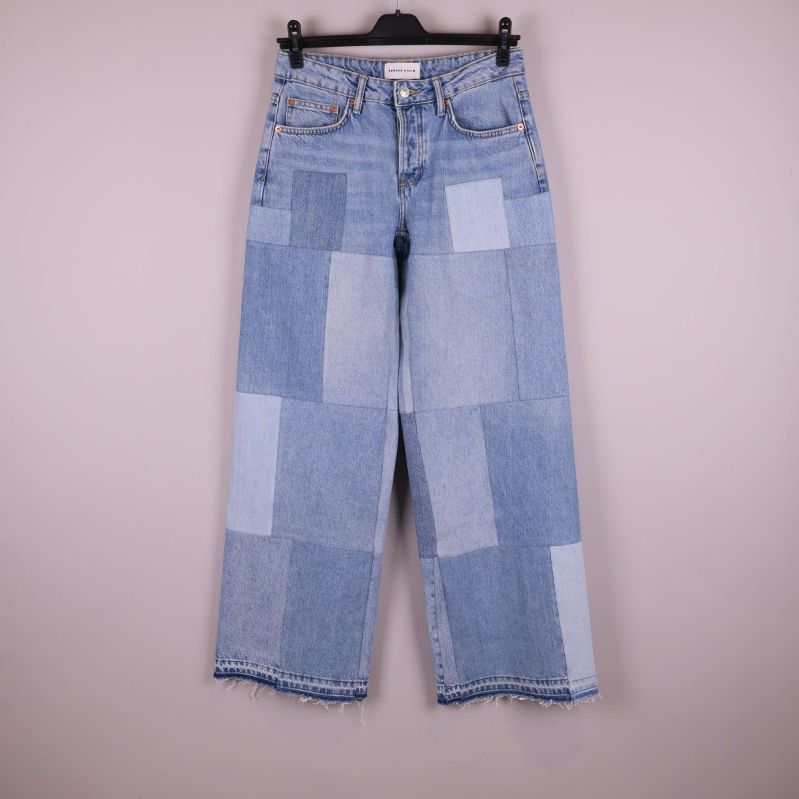 Patchwork jeans framtill med blandade denimrutor och rå fåll