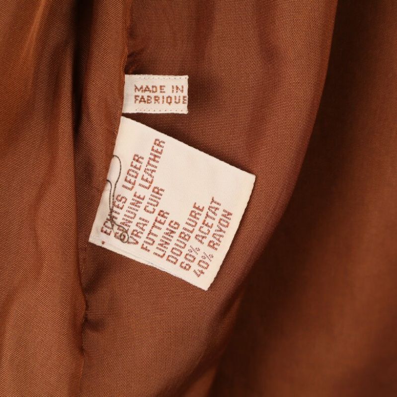 Materialetikett visar på läder och rayon