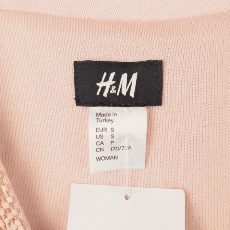 H&M etikett med storleksinformation S