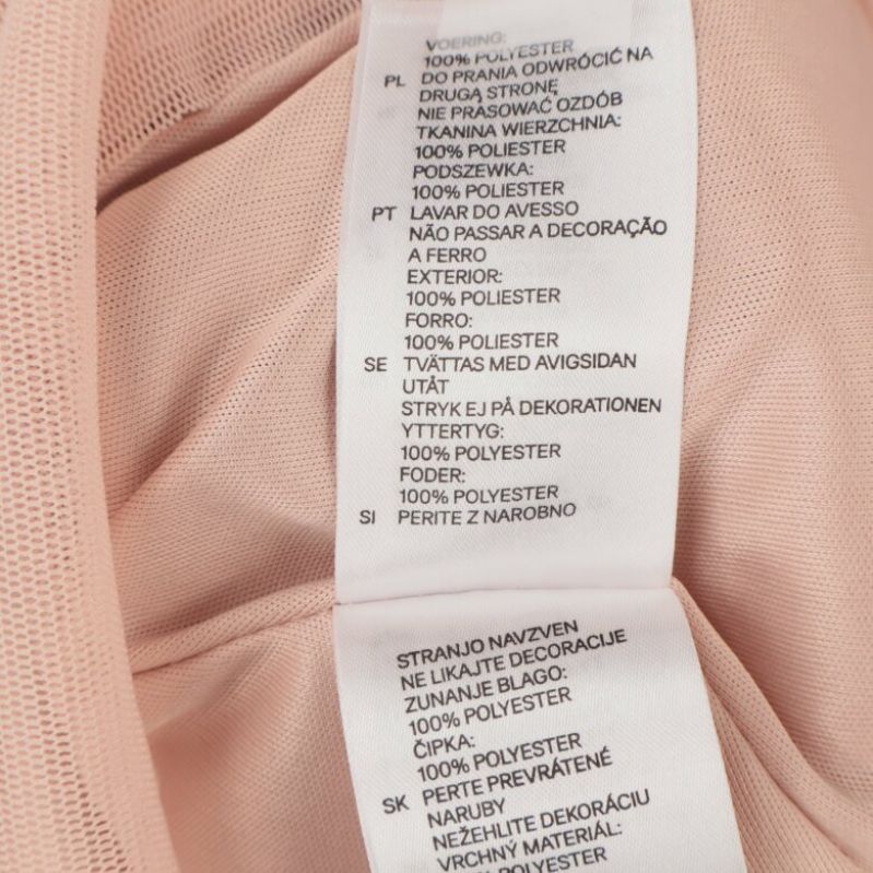 Materialinformation för klänningen, 100% polyester