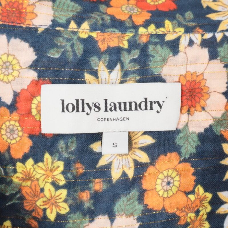 Etikett på insidan av maxiklänning: Lollys Laundry