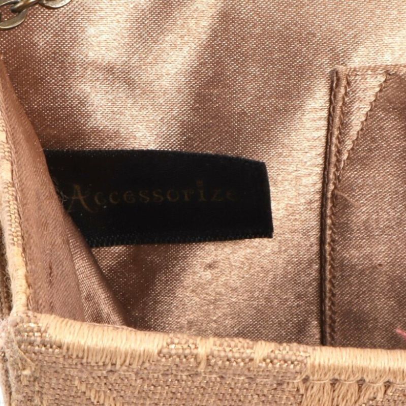 Väska med Accessorize etikett inuti