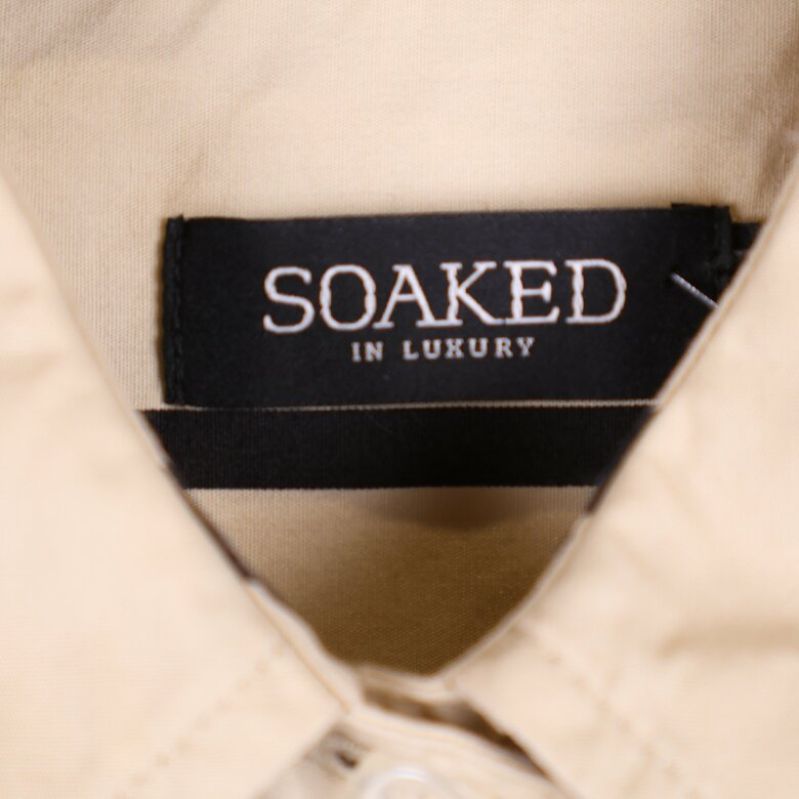Soaked in Luxury logotyp på etiketten