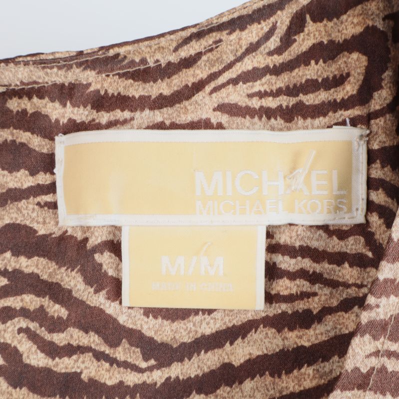 Michael Kors märkning etikett på insidan av blusen
