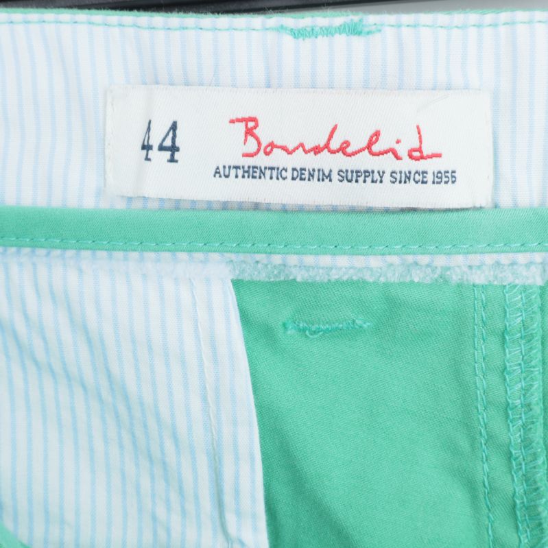 Shorts storlek och märkeslogga