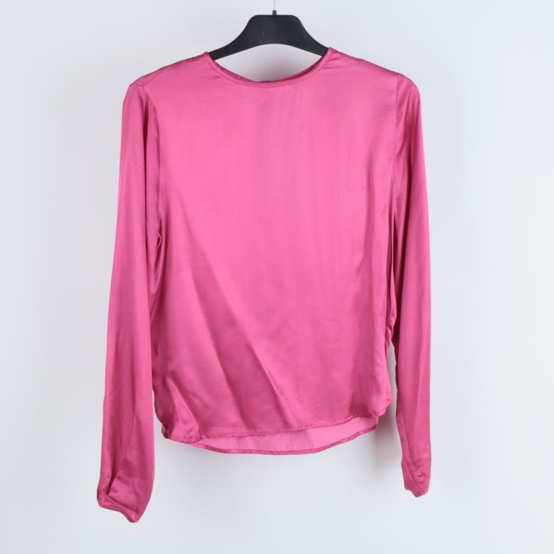 Rosa blus sidosikt med slät design