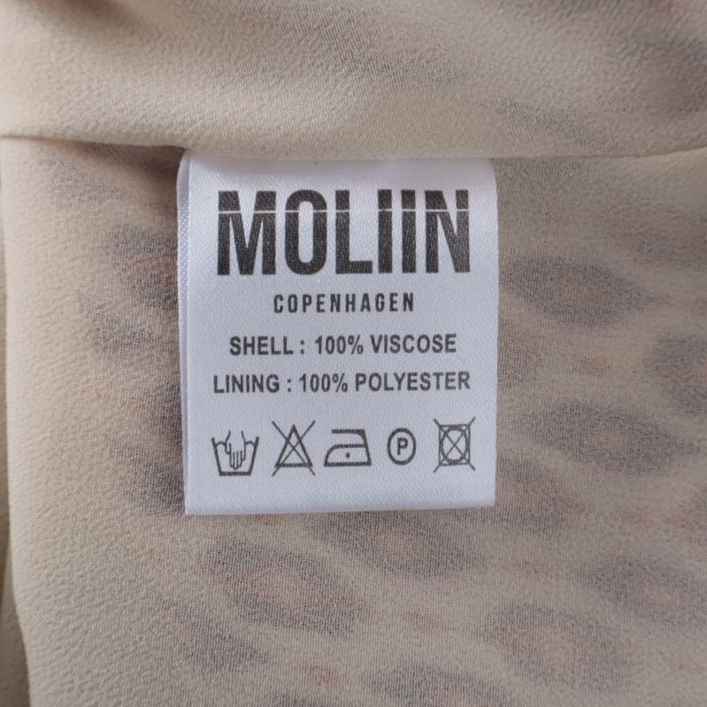 Materialetikett med viskos och polyester blandning