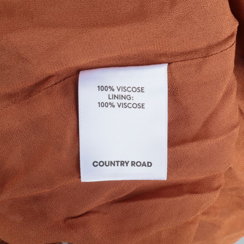 Materialetikett visar 100% viscose innehåll