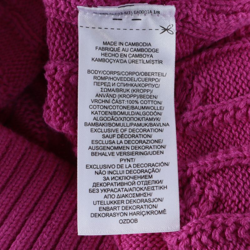 Materialetikett på insidan av tröja