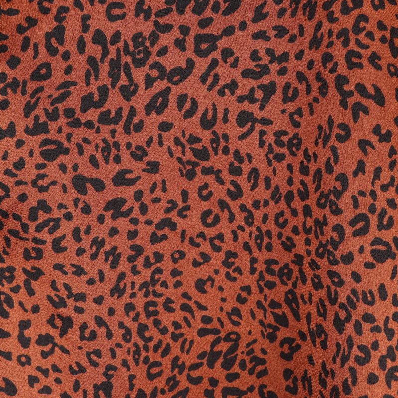 Närbild av leopardmönster på tyget