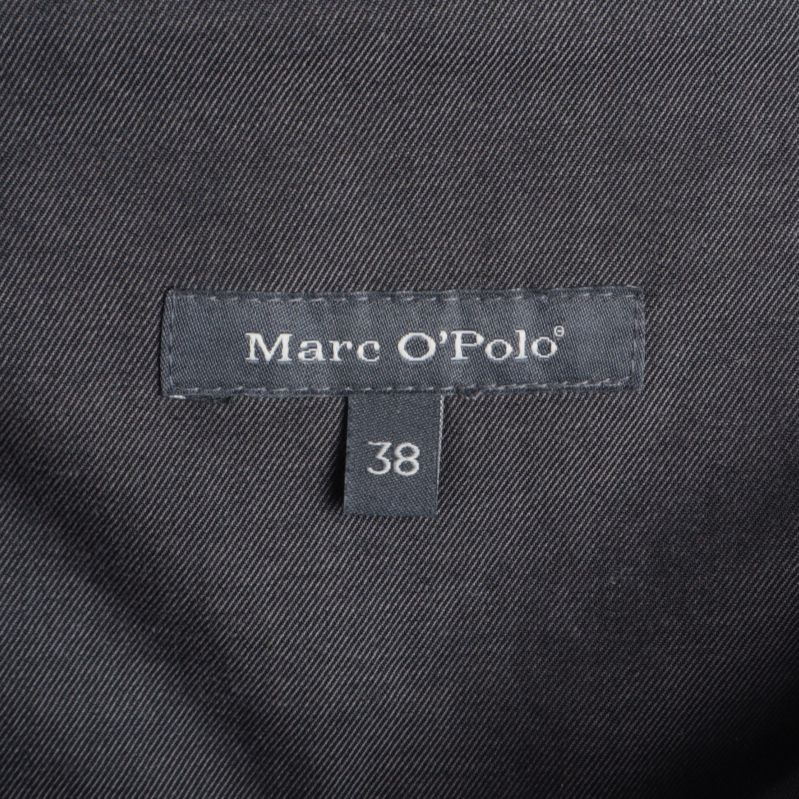 Etikett med Marc O'Polo logotyp och storlek 38
