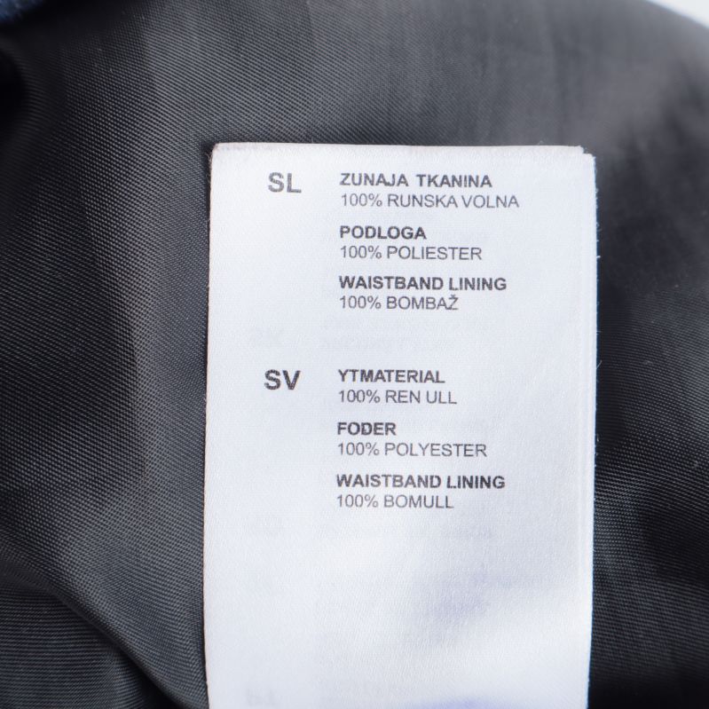 Materialinformation med ull och polyester innehåll