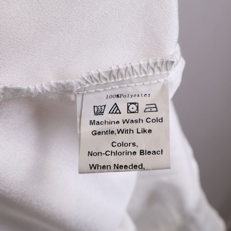 Tvättråd av 100% polyester etikett