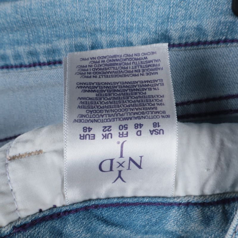 Omsorgsetikett med materialinformation