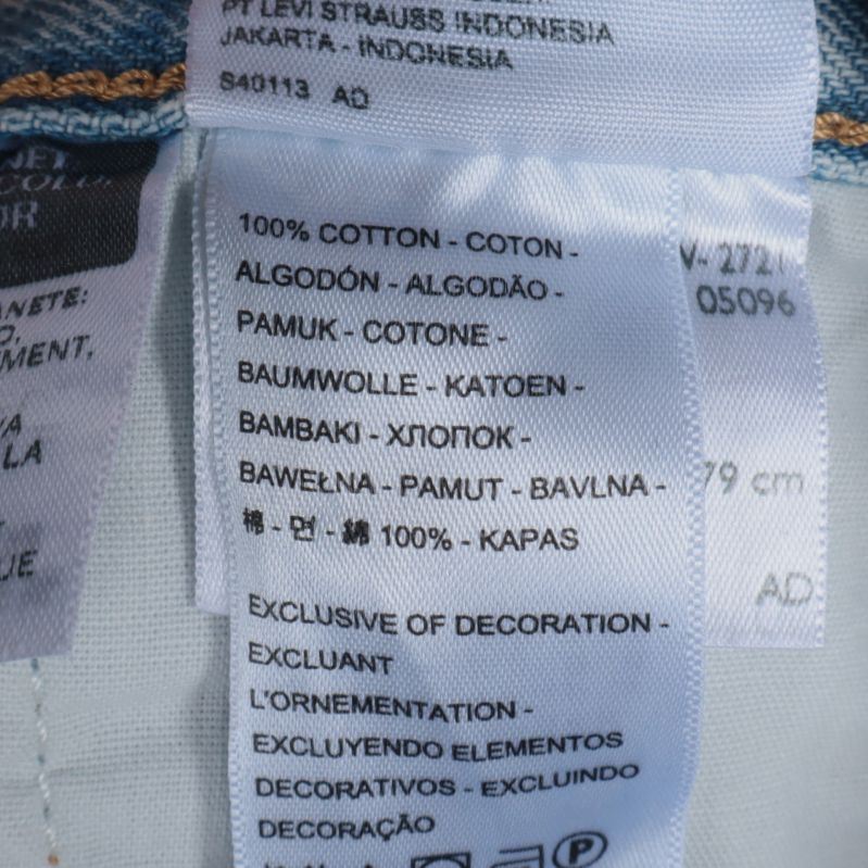 Etikett 100% bomull på jeans