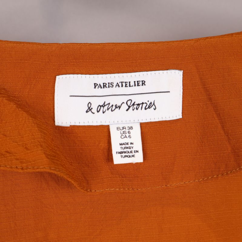 Etikett med varumärket Paris Atelier & Other Stories