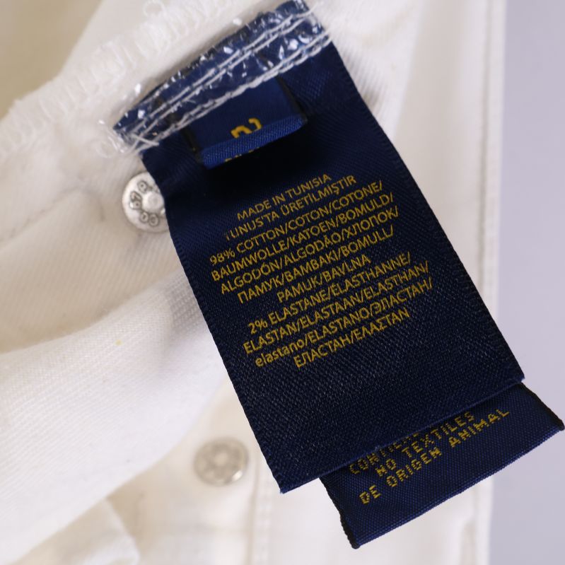 Materialetikett på insidan av jeans