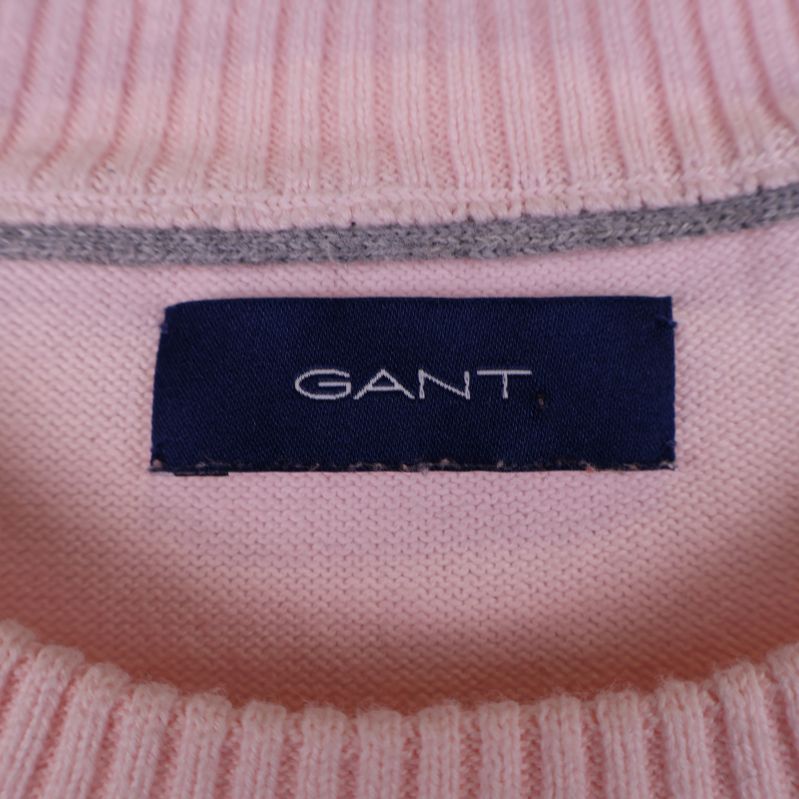 Närbild av märkesetikett med GANT