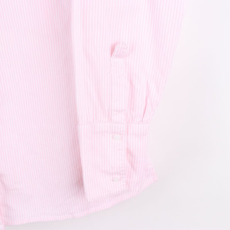 Ärm med knappstängning på skjorta