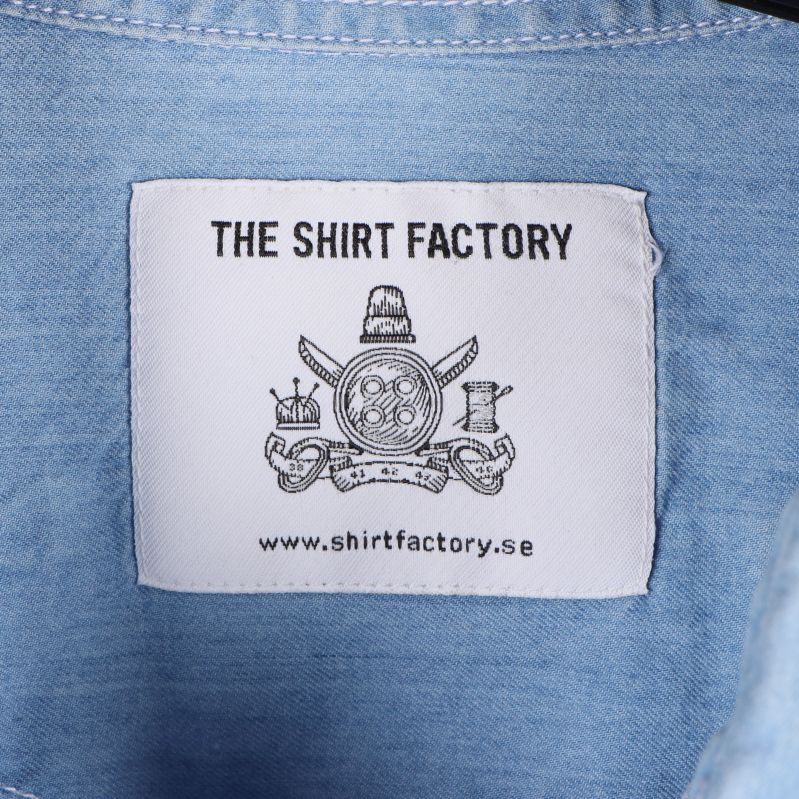 Tag med logotyp från The Shirt Factory