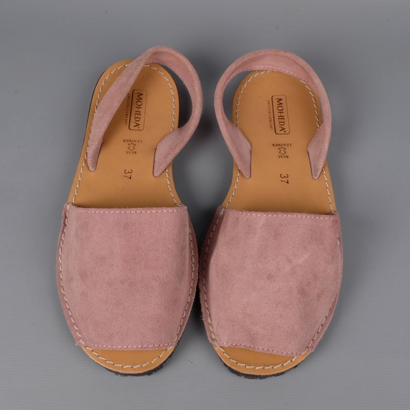Side view of pink open-toe sandals