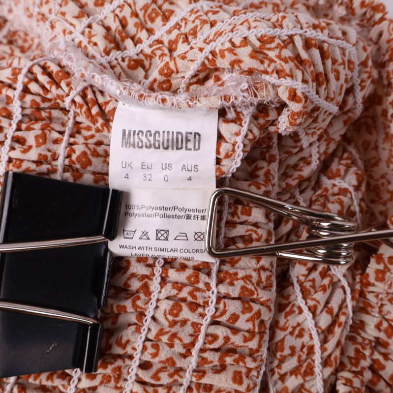 Missguided etikett med storleksinformation