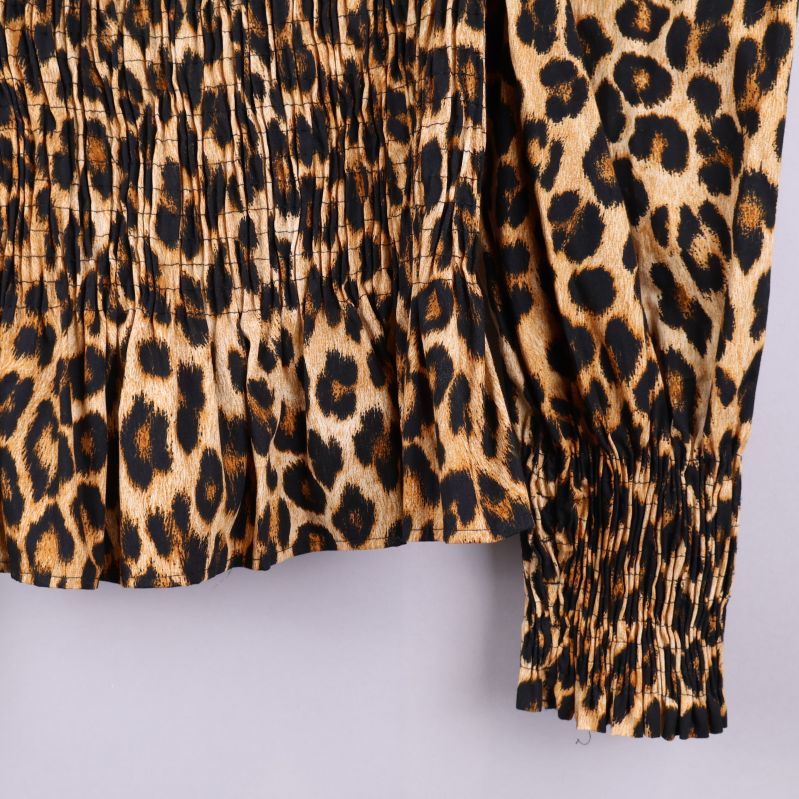 Nedersta delen av leopardmönstrad topp
