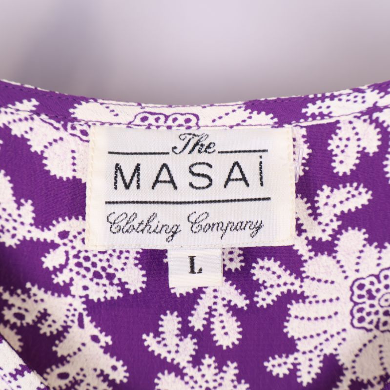 The Masai Clothing Company logga på etiketten