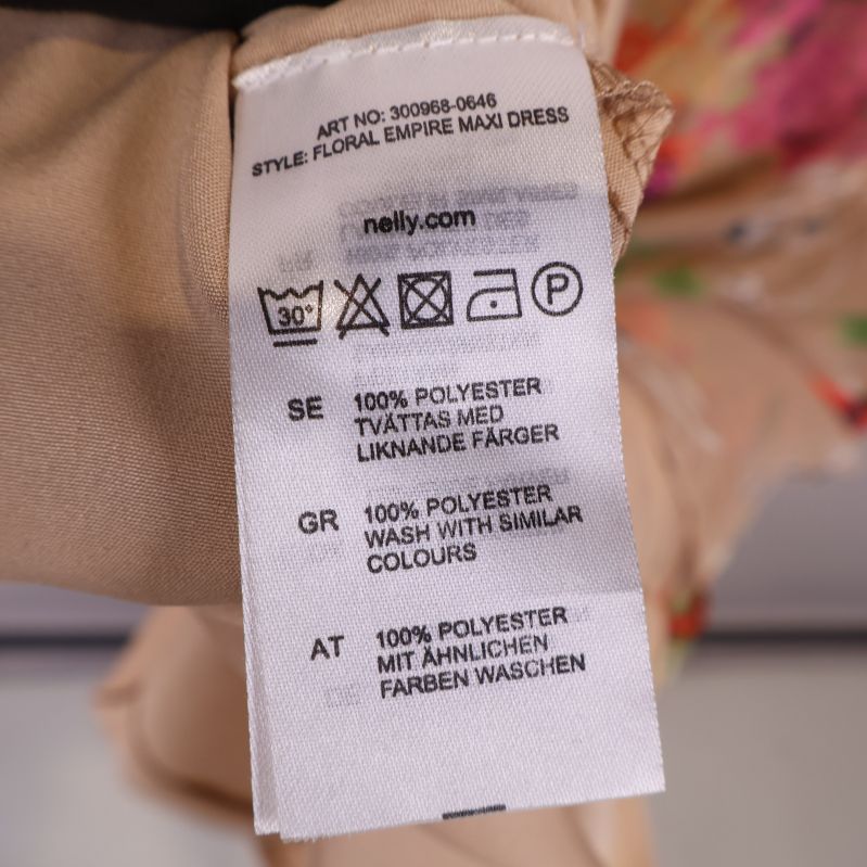 Tvättetikett med polyester information