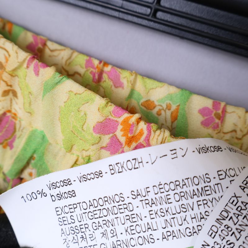 Materialinformation på etikett, 100% viskos