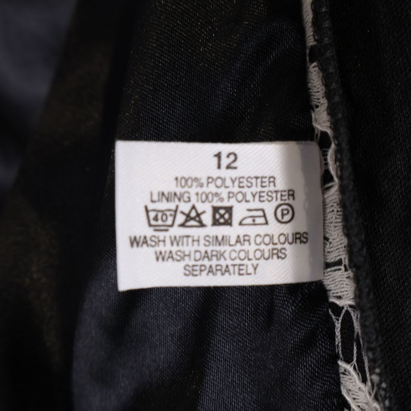 Materiallabel visar polyesterinnehåll