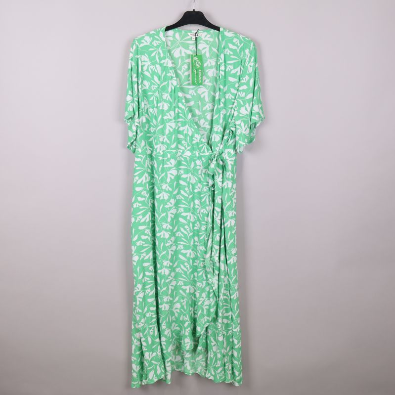 Grön och vit omlottklänning med bladmotiv framifrån