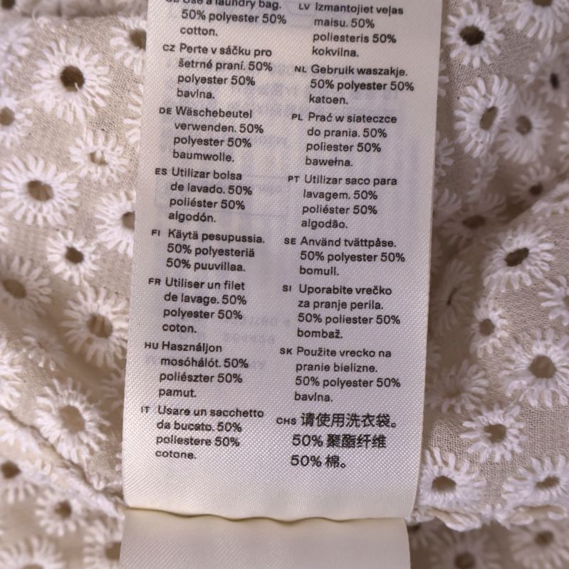 Detaljerad materialinformation på etikett