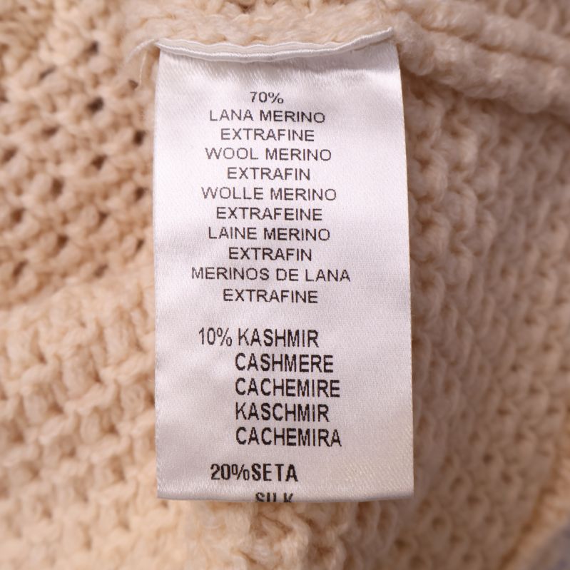 Textiletikett med materialdetaljer