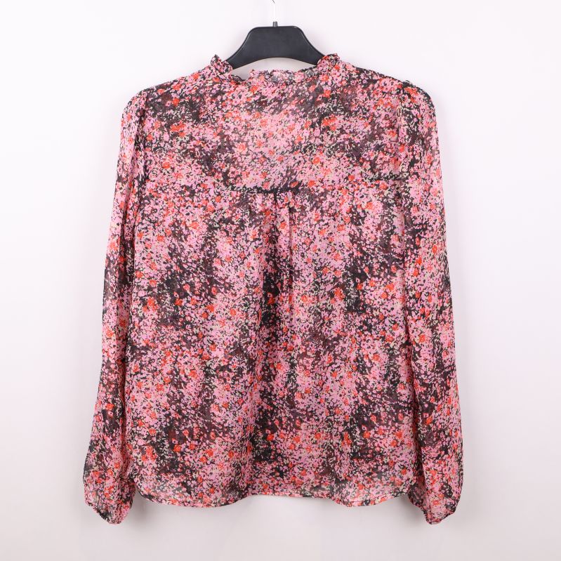 Blus med blommigt mönster, bakifrån
