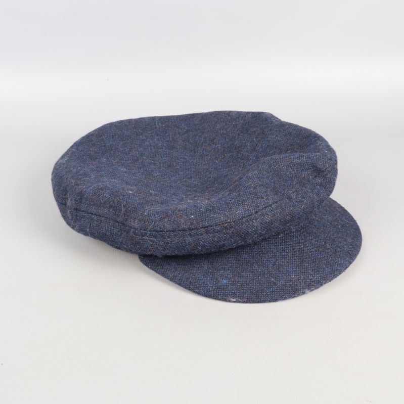 Back view of blue tweed cap