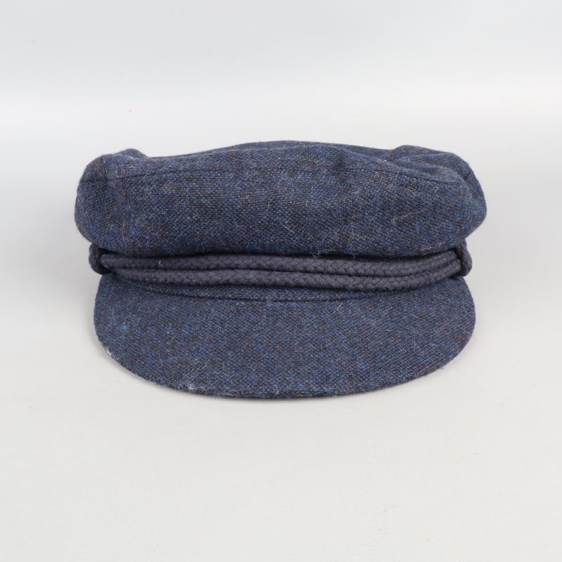 Front view of blue tweed cap