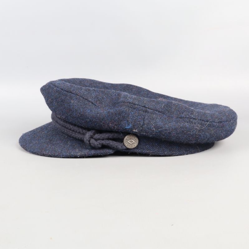Side view of blue tweed cap