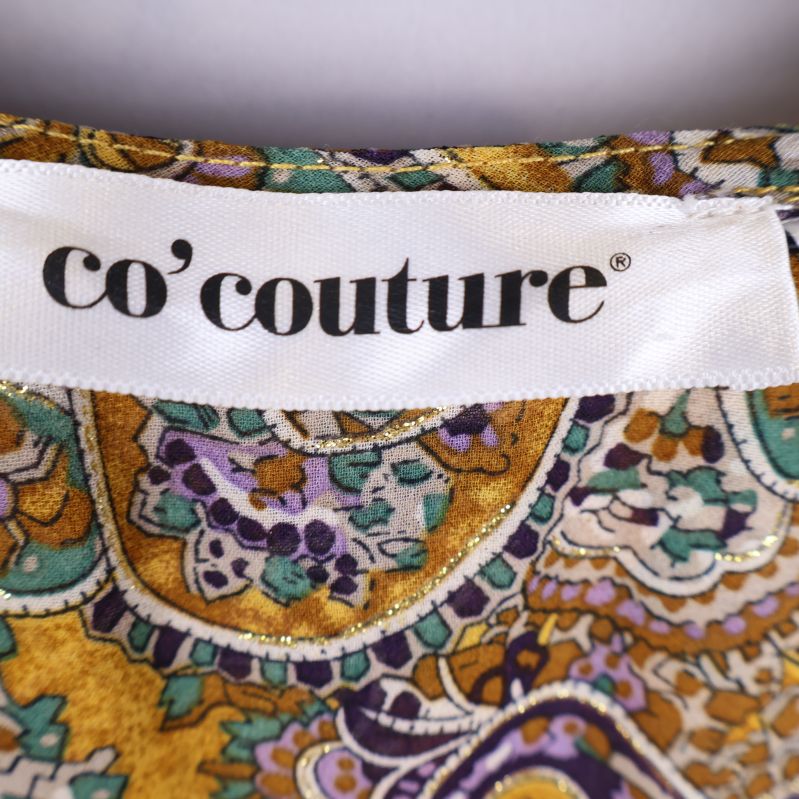 Co'couture märkeslapp på klänning