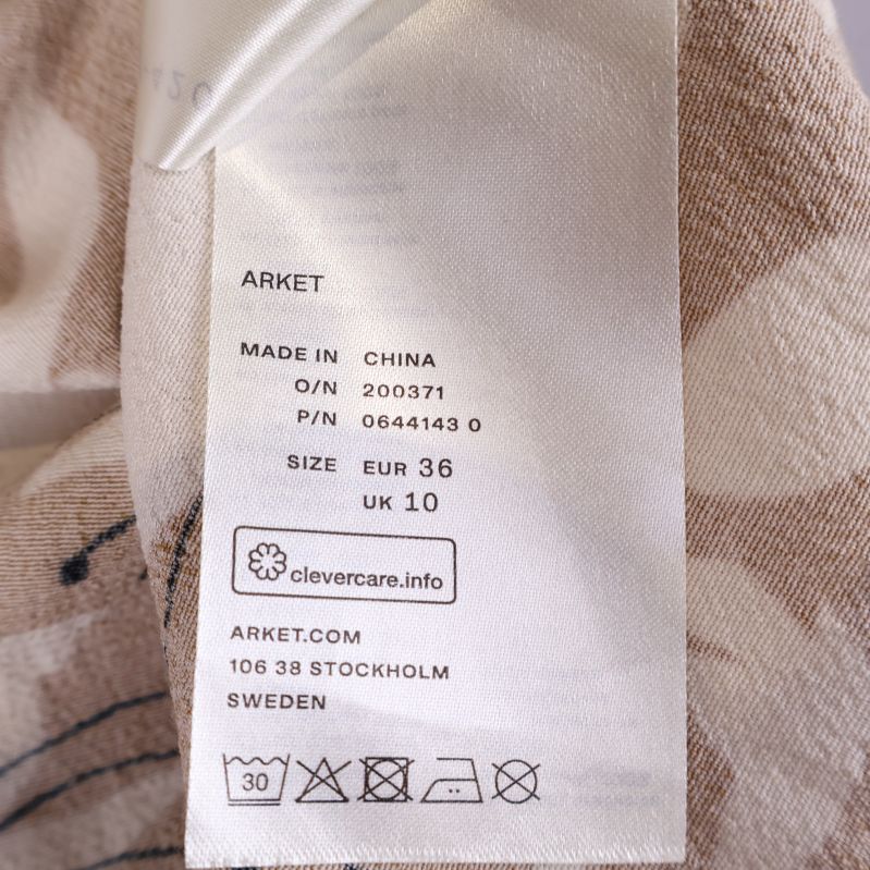 Materialetikett visar Arket och viskos