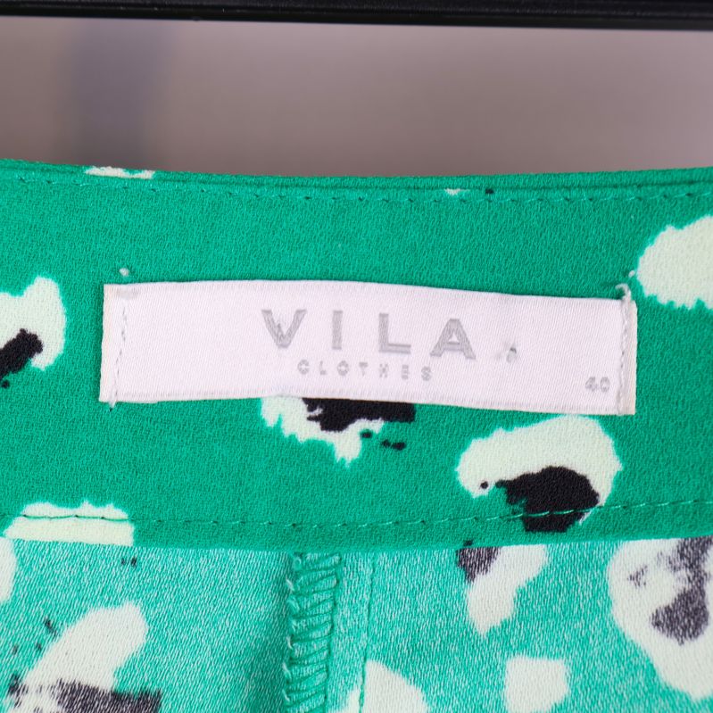 Vila kläder etikett inuti byxan