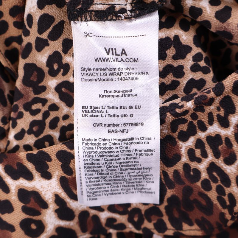 Vila etikett på leopardmönstrad klänning