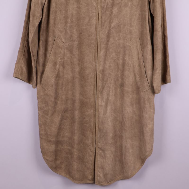 Underdel av beige kappa med fickor