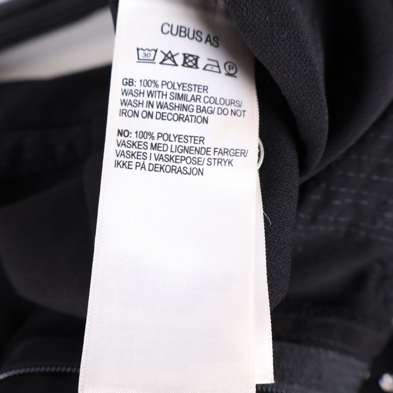 Materialetikett med polyester information
